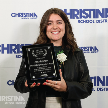 Photo of Anna Lehnerz Pulaski EEC Teacher of the Year holding plaque